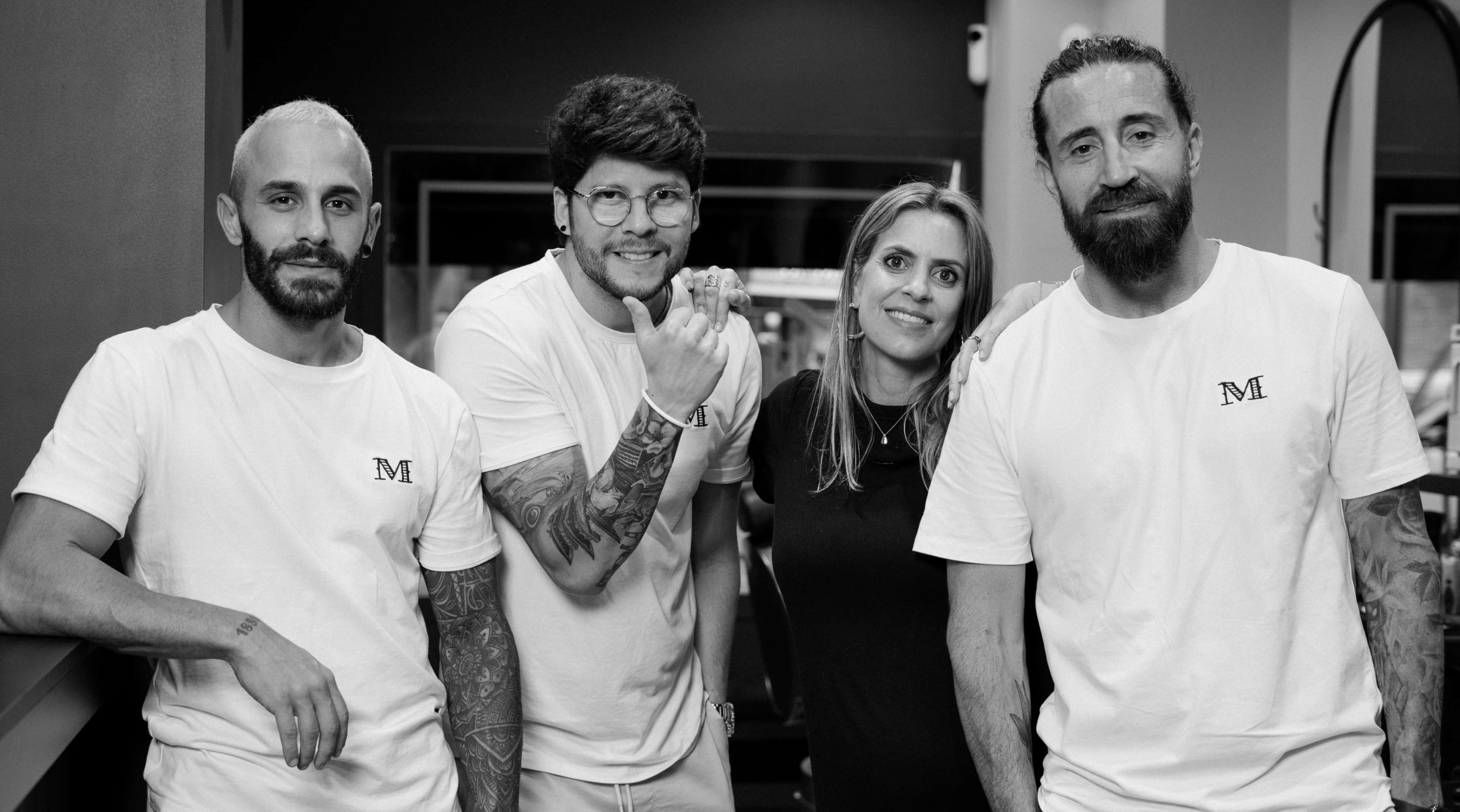 The M Salon de Caballeros team posing together